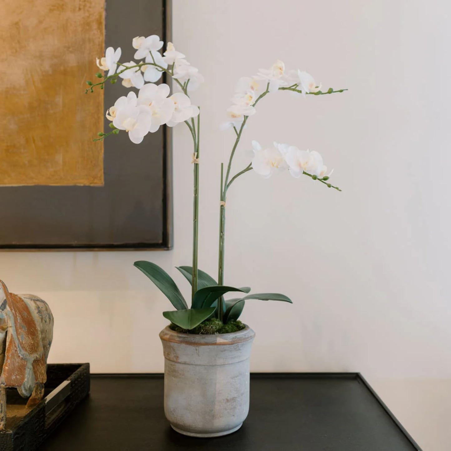 Faux White Orchid Plant Display with Grey Planter Pot for Home