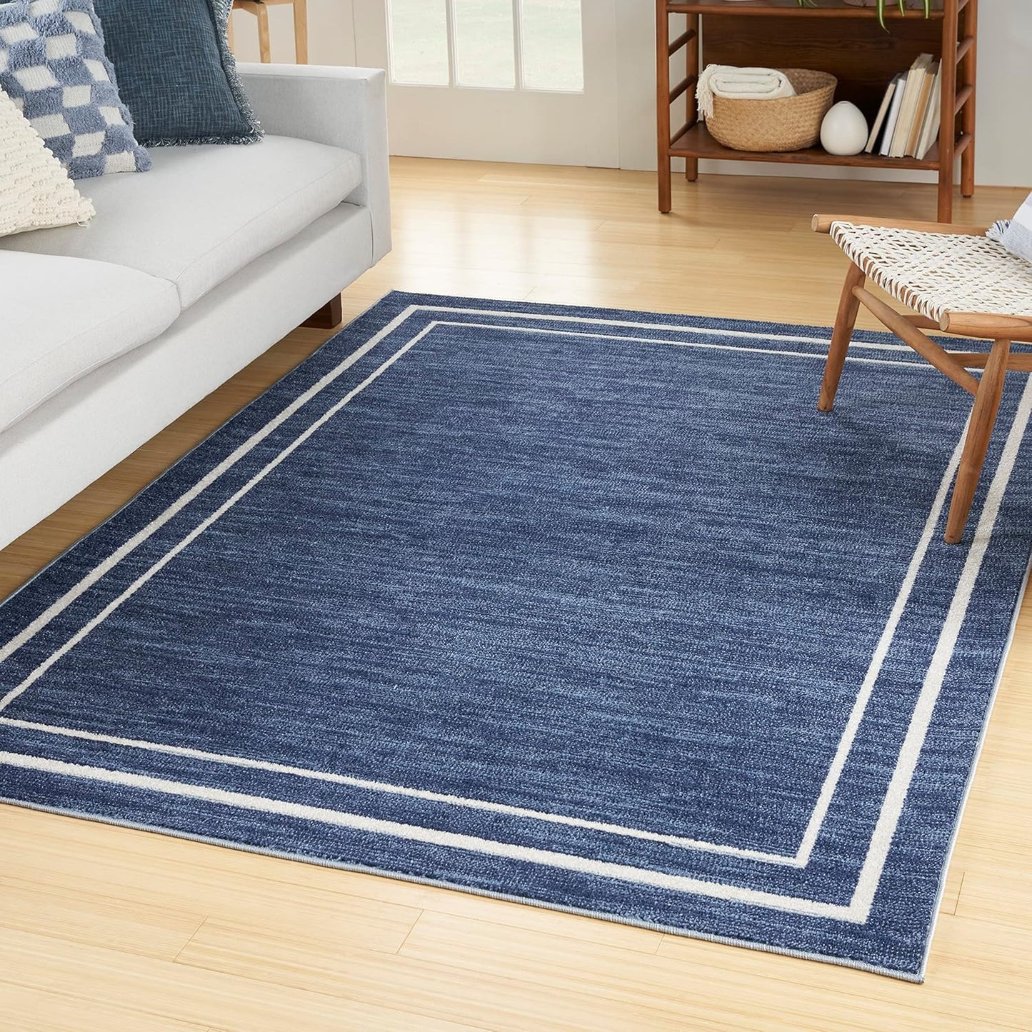 Nourison Home Essentials Indoor/Outdoor Solid Bordered Area Rug