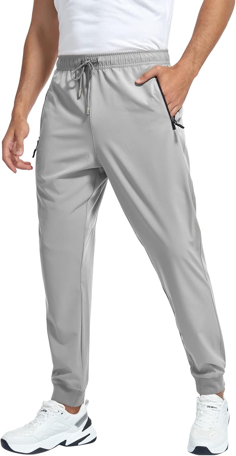 Quick Dry Jogger Pants with 3 Zip Pockets by GAXIDES