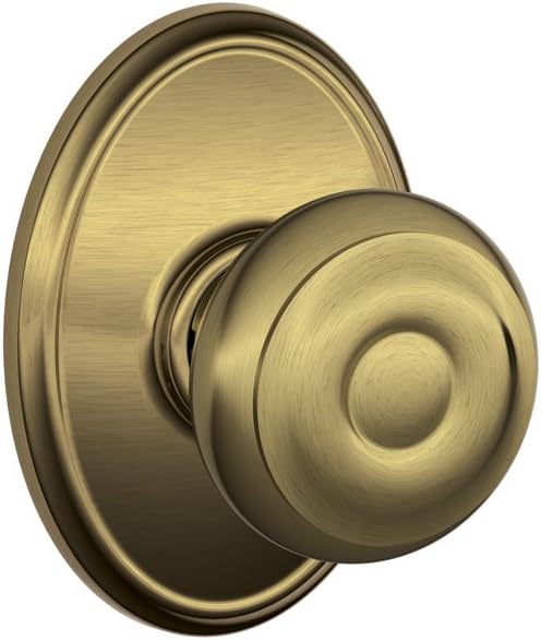 SCHLAGE F10 GEO 609 WKF Georgian Passage Knob in Antique Brass