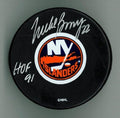 Mike Bossy Autographed Islanders Puck w/ HOF #4 - Collector's Piece