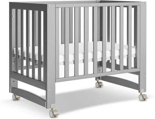 EvoNest Baby Crib 6 in 1 Convertible Mini Crib with Wheels