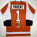 Autographed Bernie Parent Philadelphia Orange Hockey Jersey - Signed