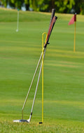 StepKick Caddy Stand for Golf Clubs - Keeps Grips Dry and Organized