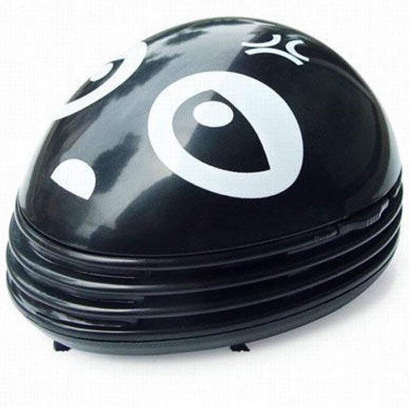 Effortlessly Tidy with Mini Desktop Vacuum