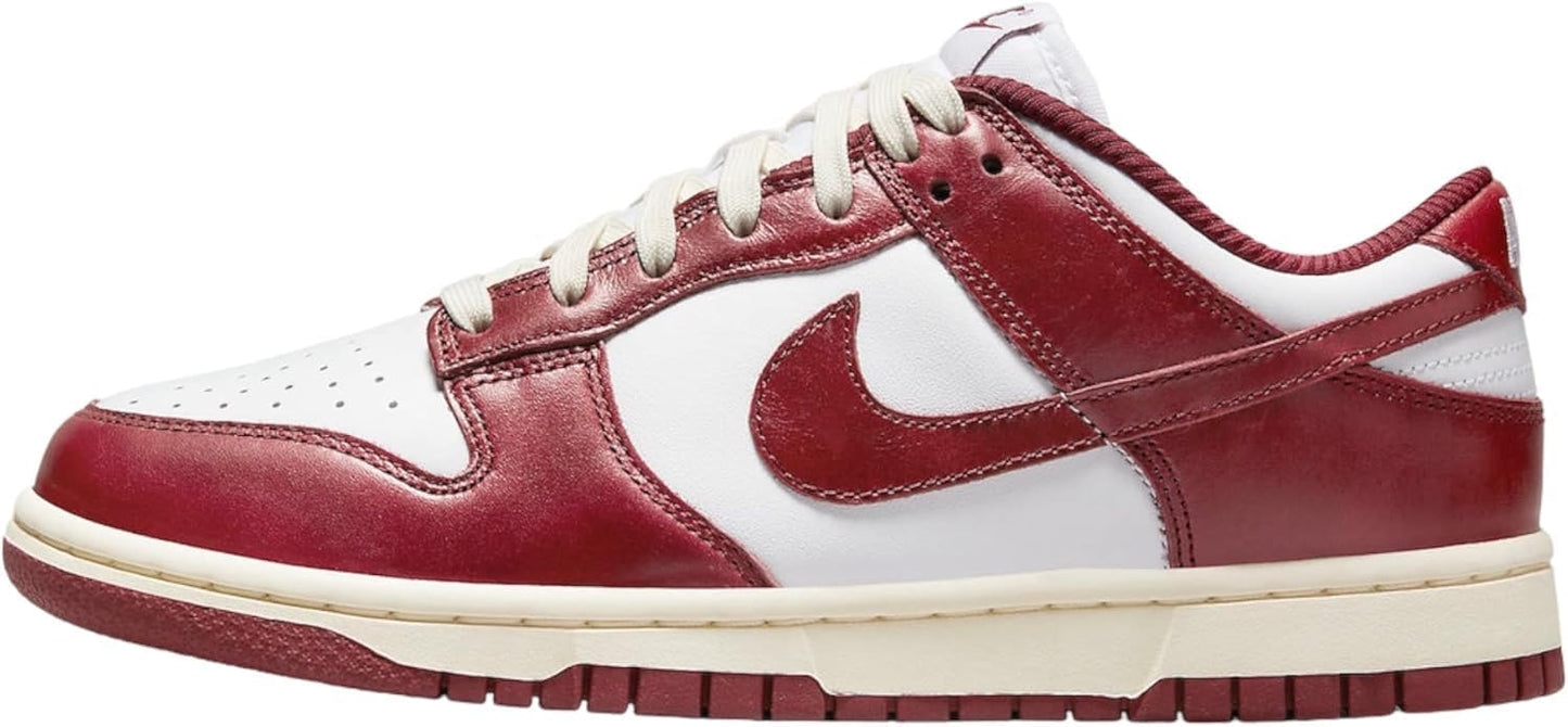 Nike Women's Dunk Low Sneaker in White/Team Red-Coconut Milk