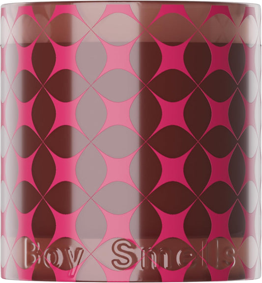 Boy Smells Starry Spice Candle for a Cozy Holiday Atmosphere