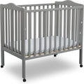 Delta Children Folding Portable Mini Baby Crib for Small Spaces