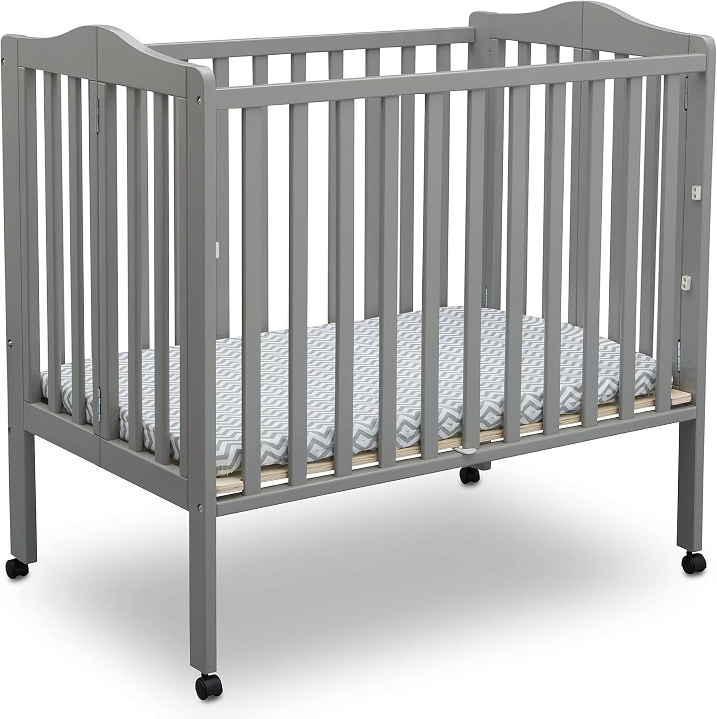 Delta Children Folding Portable Mini Baby Crib for Small Spaces