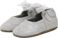 Slip-resistant crib shoes for baby girls by Robeez soft soles