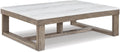 Signature Design by Ashley Marble Coffee Table - Elegant & Chic