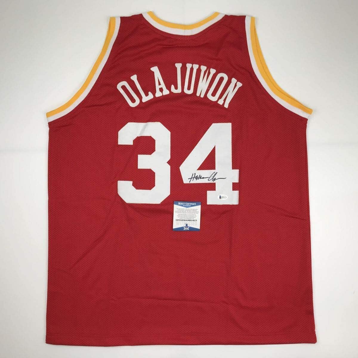 Autographed Hakeem Olajuwon Houston Red Basketball Jersey
