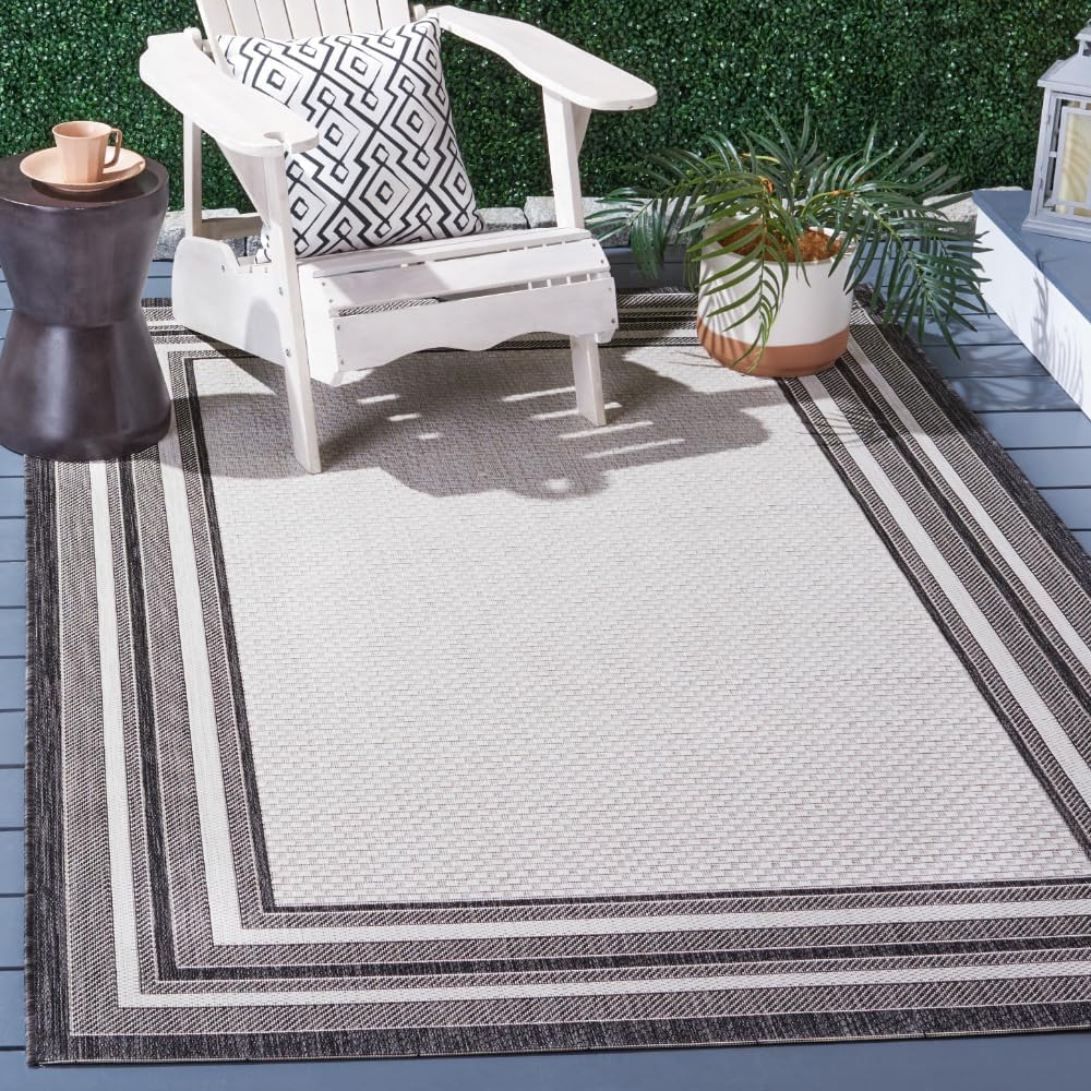 SAFAVIEH Courtyard Collection 5ft 3in x 7ft 7in Ivory/Black Rug