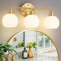 Stunning Gold Vanity Light Fixtures for Modern Bathrooms and More