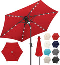 FLAME&SHADE 7.5 ft Solar Patio Table Umbrella with LED Lights - Night