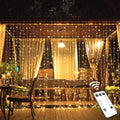 JMEXSUSS 600 LED Christmas Curtain Lights - Warm White Backdrop