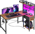 PRAISUN L Shaped Gaming Desk with LED Lights and Power Outlets