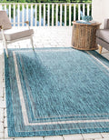 Outdoor Border Area Rug 4 ft 1 in x 6 ft 1 in Teal/Ivory - Bordered