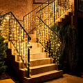 Eueasy Curtain Lights Outdoor, 300 LED Stair Lights - Warm White Glow