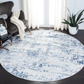 SAFAVIEH Amelia 9 ft Round Area Rug - Modern Ivory & Navy