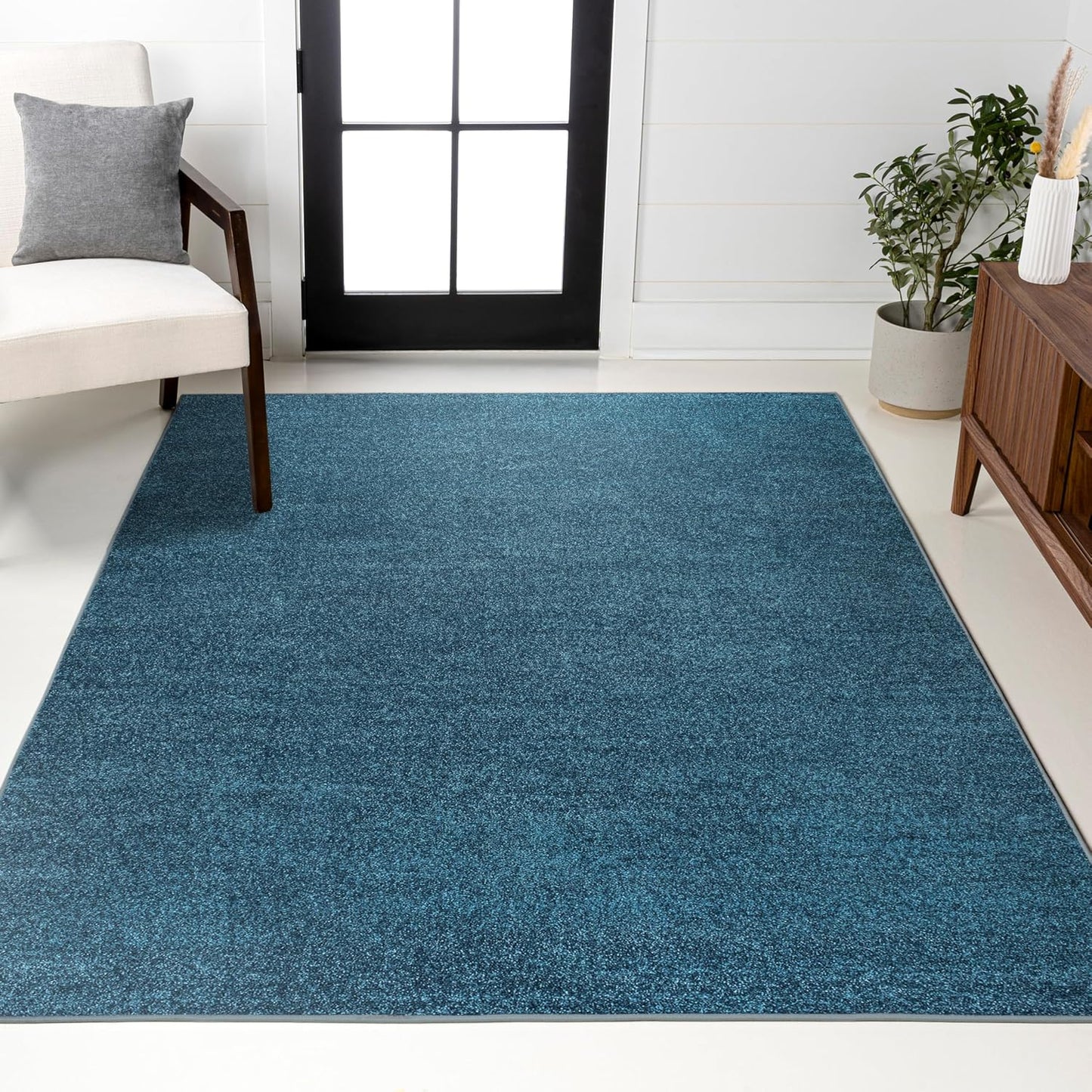 Haze Solid Low-Pile Turquoise Indoor Area Rug for Modern Homes