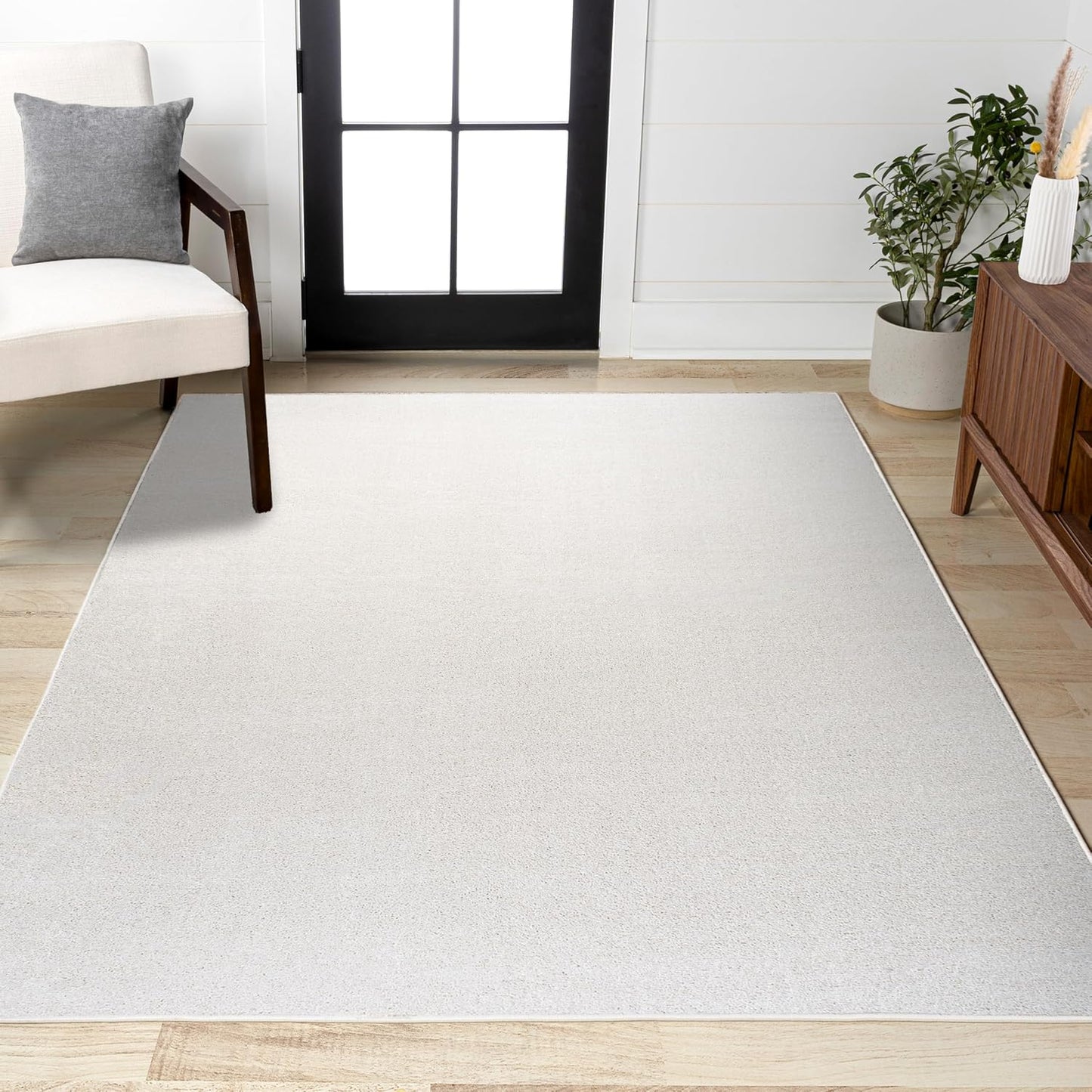 Haze Solid Low-Pile Cream Indoor Area Rug for Modern Homes
