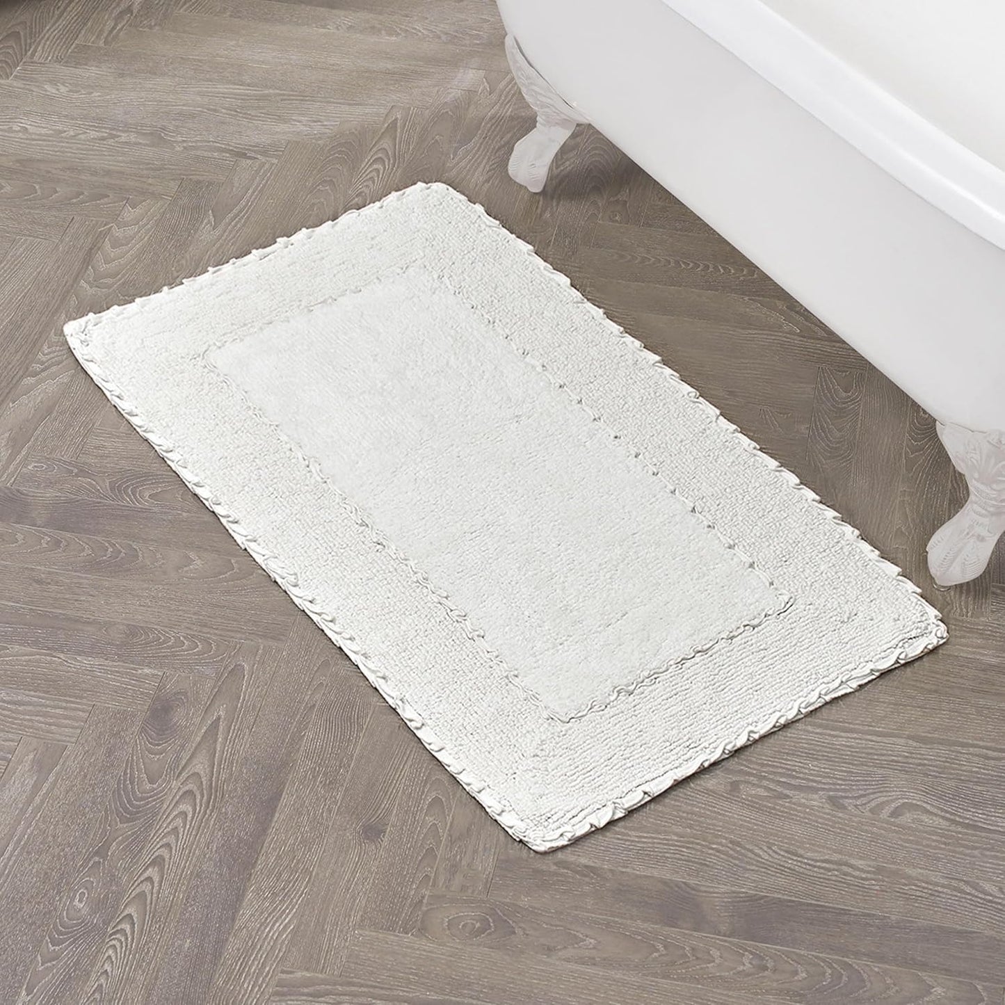 Laura Ashley Ruffle Border White Bath Rug for Elegant Spaces