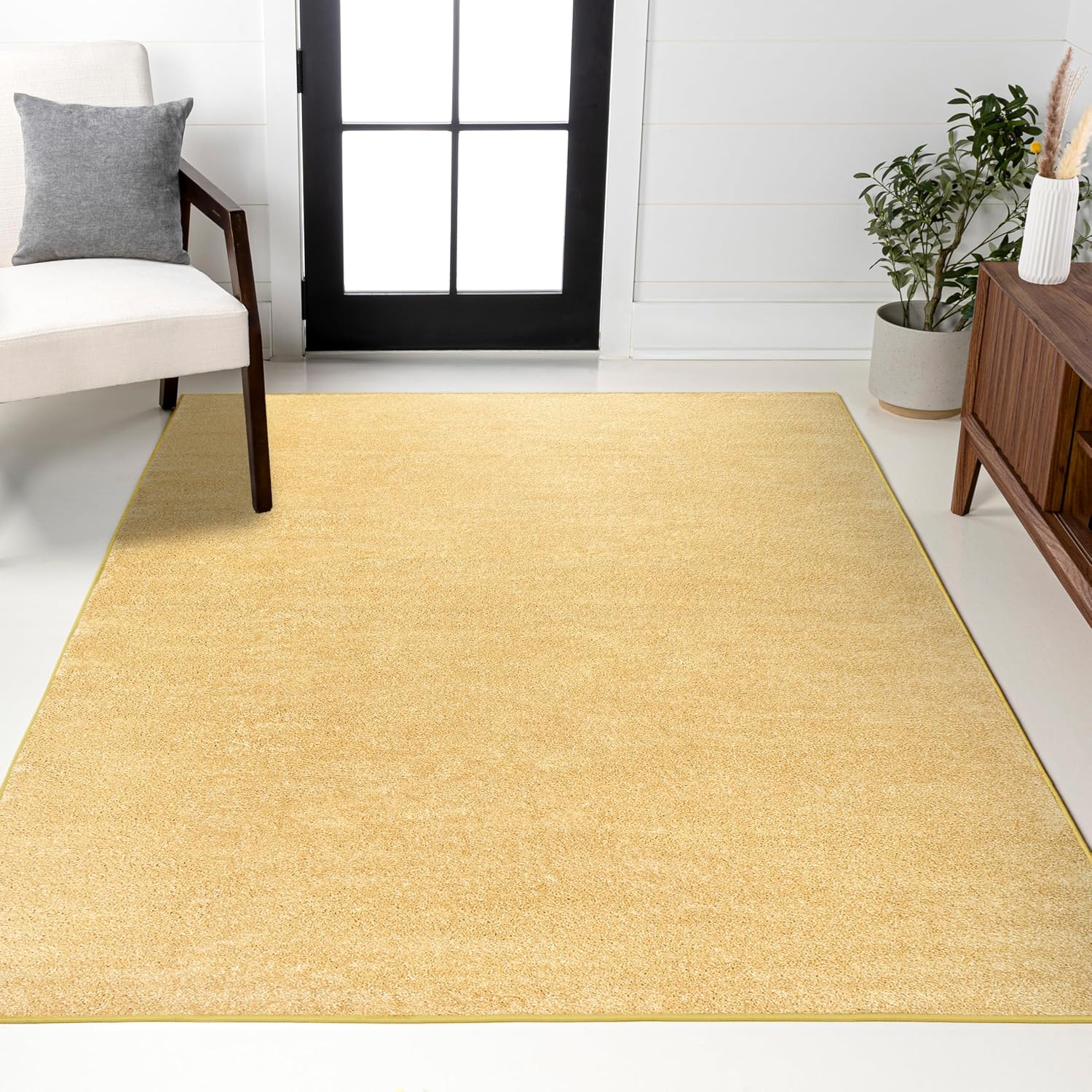 Haze Solid Low-Pile Mustard Indoor Area Rug for Modern Homes
