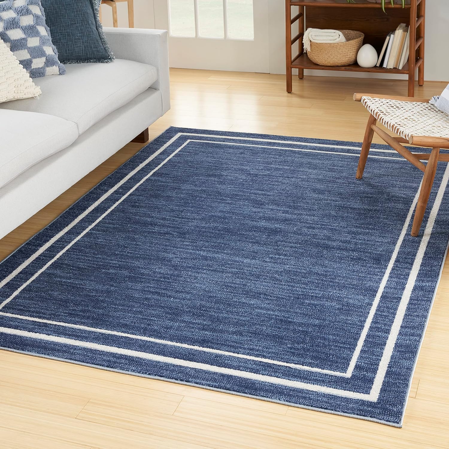 Nourison Home Essentials Indoor/Outdoor Solid Bordered Area Rug
