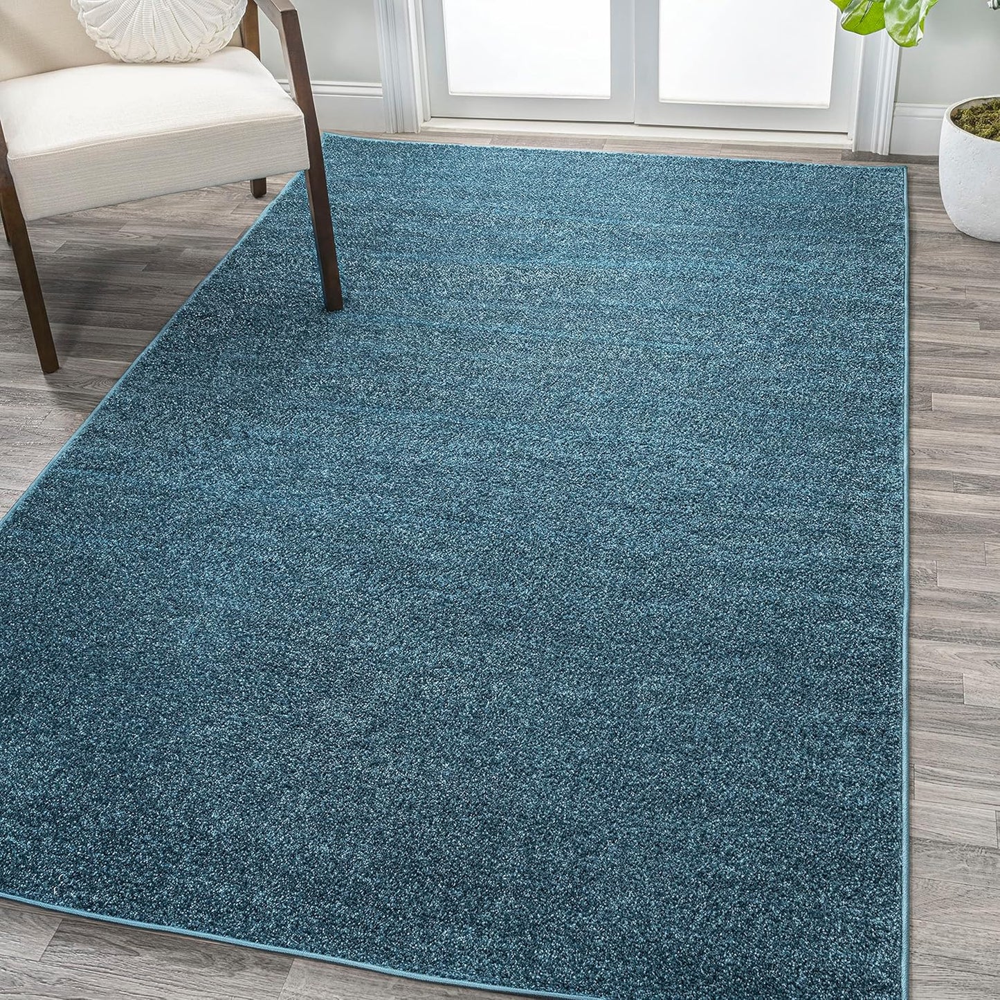 Haze Solid Low-Pile Turquoise Indoor Area Rug for Any Room