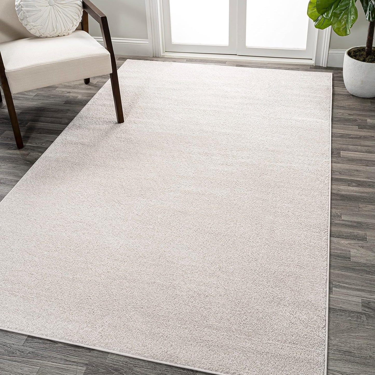 Haze Solid Low-Pile Cream Indoor Area Rug 5x8 for Home