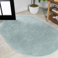 Haze Solid Low-Pile Aqua Blue 5x8 Oval Area Rug - Easy-Cleaning